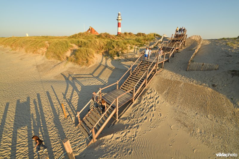 Houten loopbrug aan de IJzermonding